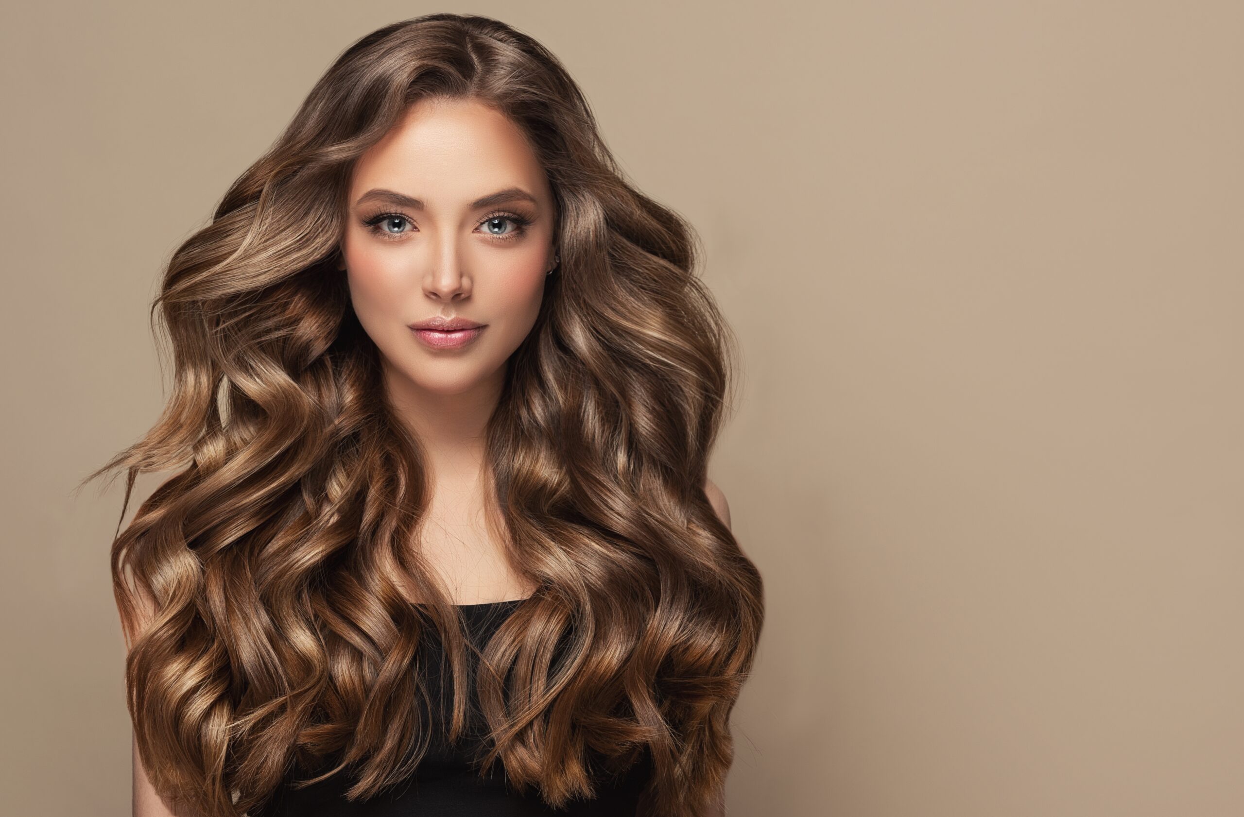 Woman with long wavy hair extensions