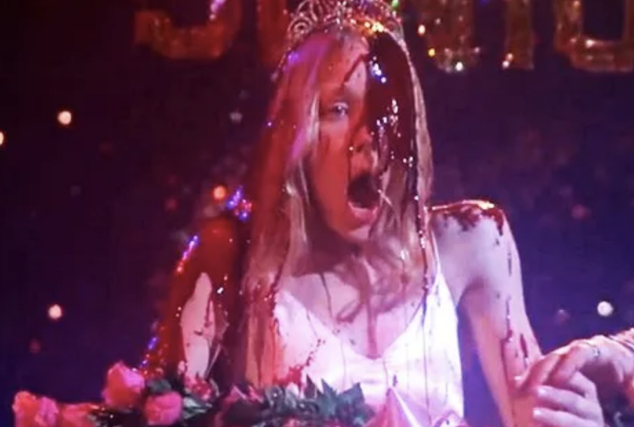 Prom queen with blood spilled on her head from the movie Carrie