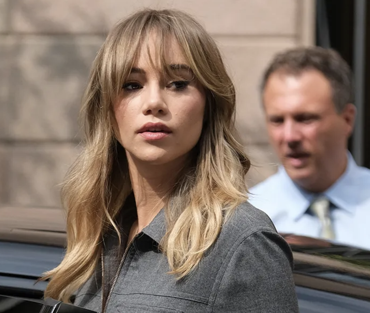 Blonde woman with long layered blonde hair