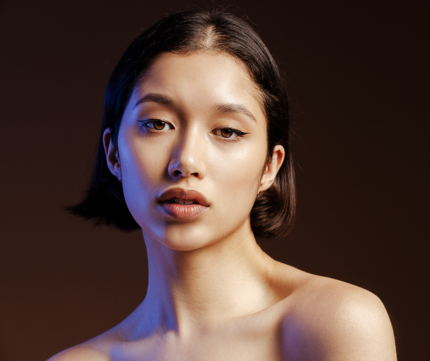 Young woman with short brown trending hairstyle