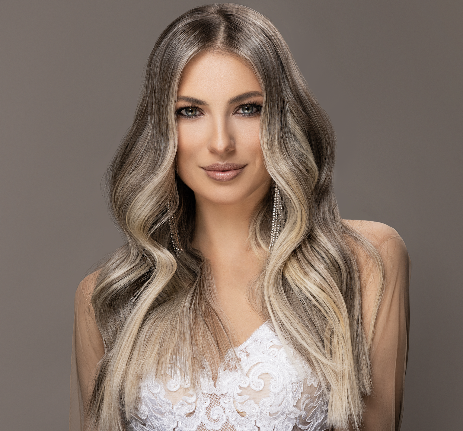 Bride with long ashy blonde hairstyle on wedding day