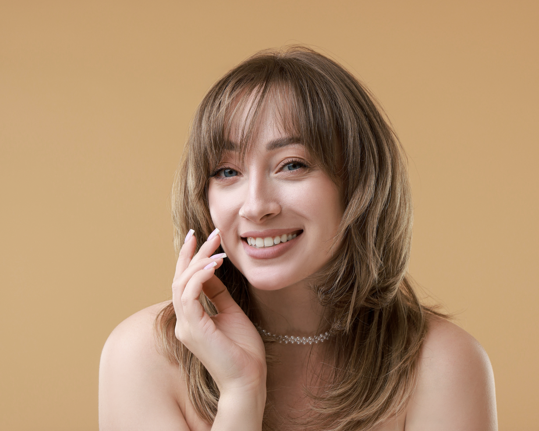 Brunette woman with layered kitten haircut